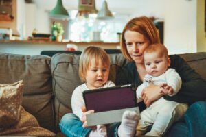 image of mother with kids working